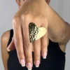 Golden-Love-ring-heart-shaped-crafted-in-18k-gold-plated-bronze-with-a-delicate-hammered-finish-that-highlights-its-unique-shine-and-texture