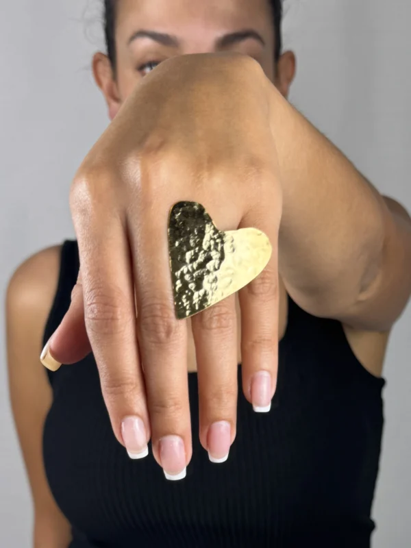 Golden-Love-ring-heart-shaped-crafted-in-18k-gold-plated-bronze-with-a-delicate-hammered-finish-that-highlights-its-unique-shine-and-texture