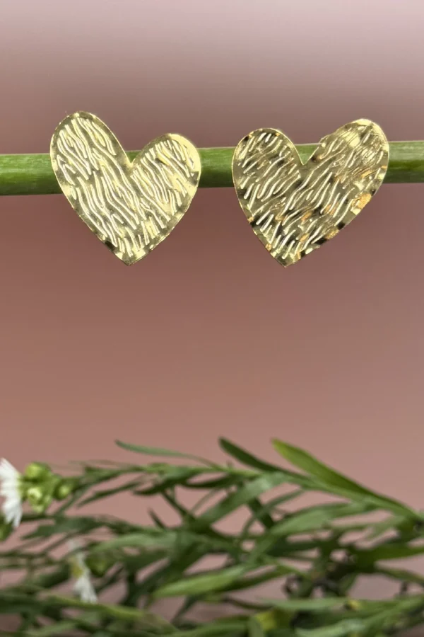 Golden-Passion-earrings-crafted-in-18k-gold-plated-bronze-with-a-wavy-pattern-that-evokes-movement-and-depth