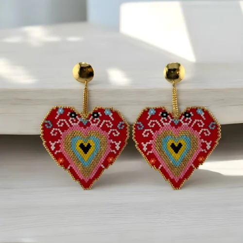 Sacred-Heart-earrings-handcrafted-with-Miyuki-beads-woven-piece-by-piece-in-a-design-inspired-by-ex-voto-hearts
