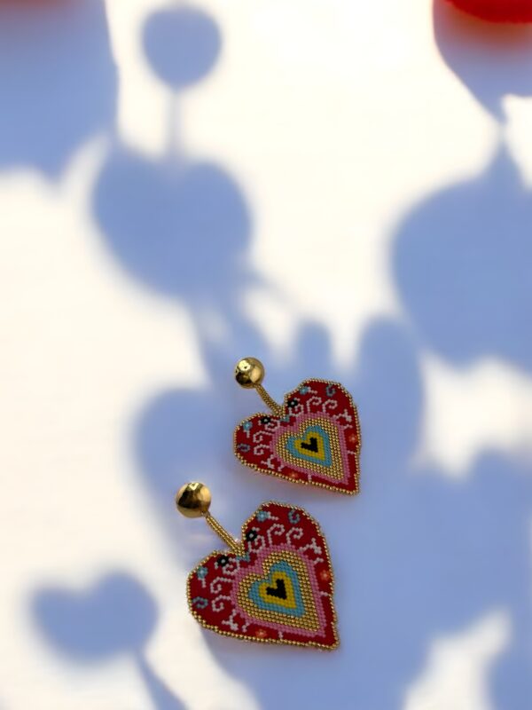 Sacred-Heart-earrings-handcrafted-with-Miyuki-beads-woven-piece-by-piece-in-a-design-inspired-by-ex-voto-hearts