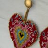 Sacred-Heart-earrings-handcrafted-with-Miyuki-beads-woven-piece-by-piece-in-a-design-inspired-by-ex-voto-hearts