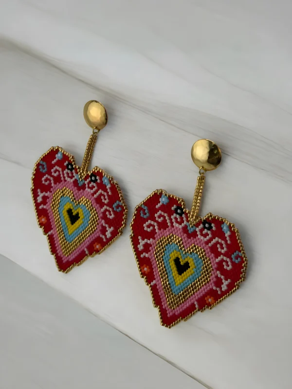 Sacred-Heart-earrings-handcrafted-with-Miyuki-beads-woven-piece-by-piece-in-a-design-inspired-by-ex-voto-hearts