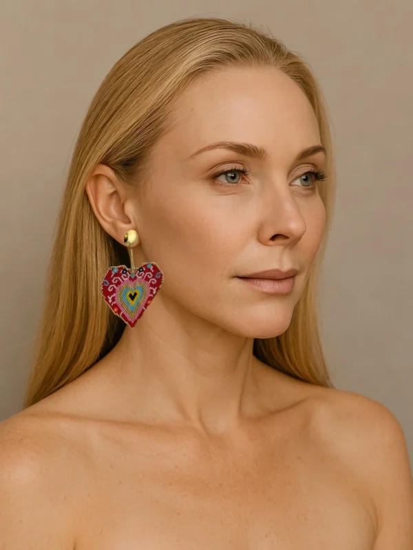 Sacred-Heart-earrings-handcrafted-with-Miyuki-beads-woven-piece-by-piece-in-a-design-inspired-by-ex-voto-hearts