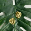 Jungle-earrings-in-monstera-leaf-shape-crafted-in-18k-gold-plated-bronze-with-a-textured-finish-that-enhances-their-organic-design