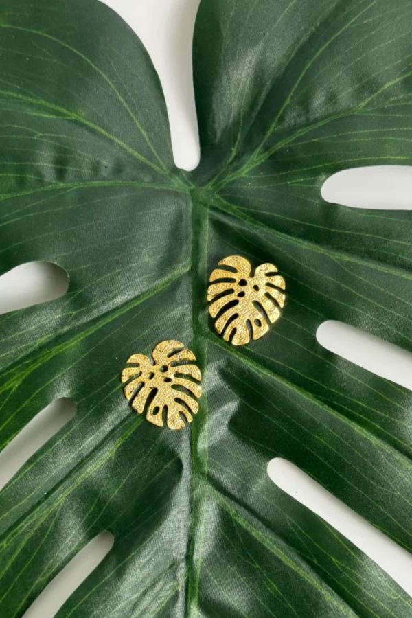 Jungle-earrings-in-monstera-leaf-shape-crafted-in-18k-gold-plated-bronze-with-a-textured-finish-that-enhances-their-organic-design
