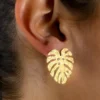 Jungle-earrings-in-monstera-leaf-shape-crafted-in-18k-gold-plated-bronze-with-a-textured-finish-that-enhances-their-organic-design