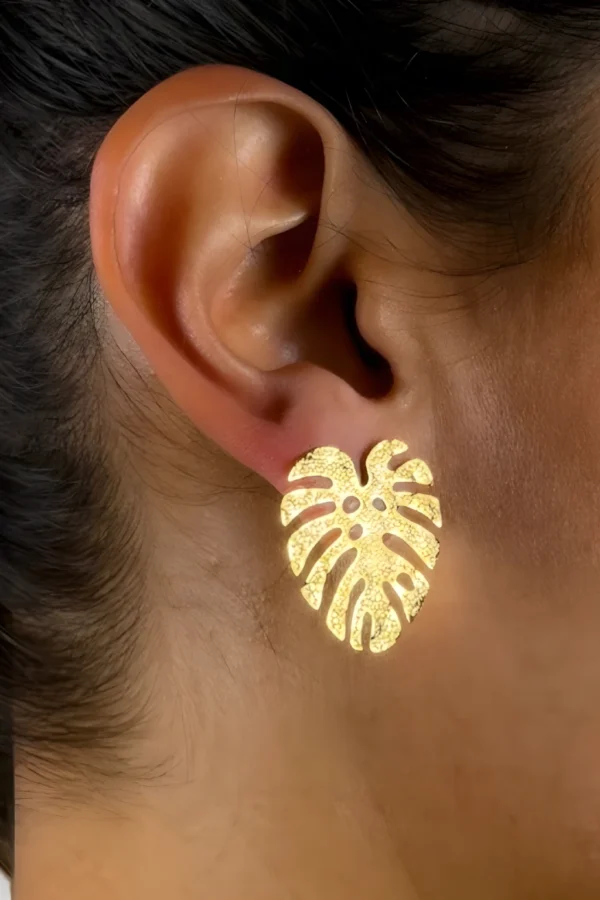 Jungle-earrings-in-monstera-leaf-shape-crafted-in-18k-gold-plated-bronze-with-a-textured-finish-that-enhances-their-organic-design