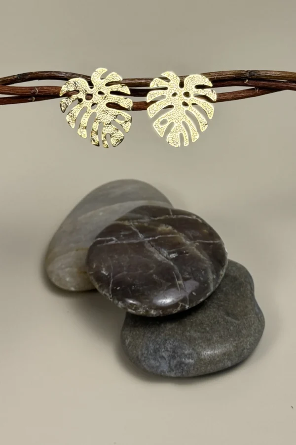 Jungle-earrings-in-monstera-leaf-shape-crafted-in-18k-gold-plated-bronze-with-a-textured-finish-that-enhances-their-organic-design