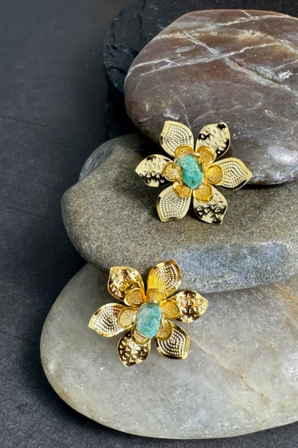 Natural-Essence-earrings-crafted-in-18k-gold-plated-bronze-with-a-young-emerald-at-the-center