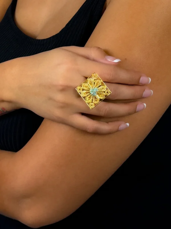 Royal-Essence-ring-crafted-in-18k-gold-plated-bronze-with-a-detailed-geometric-design