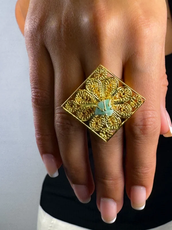Royal-Essence-ring-crafted-in-18k-gold-plated-bronze-with-a-detailed-geometric-design