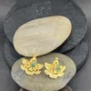 Sacred-Lotus-earrings-crafted-in-18k-gold-plated-bronze-with-a-young-emerald-in-the-center