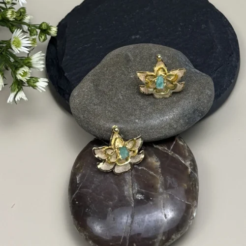 Sacred-Lotus-earrings-crafted-in-18k-gold-plated-bronze-with-a-young-emerald-in-the-center
