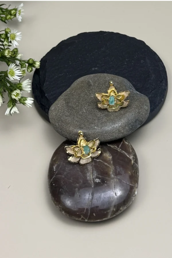 Sacred-Lotus-earrings-crafted-in-18k-gold-plated-bronze-with-a-young-emerald-in-the-center